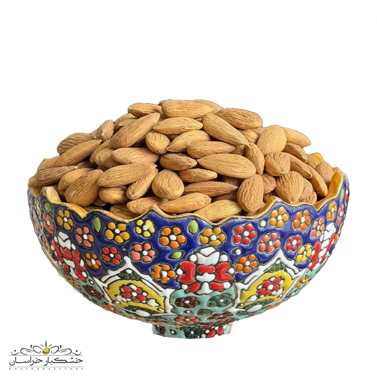 عکس مغز بادام درختی زرین خام تازه، دانه‌های درشت کرمی با پوست نازک و بافت ترد، بادام ایرانی اعلا با طعم شیرین طبیعی، بسته‌بندی ۵۰۰ گرمی غنی از پروتئین و ویتامین E برای میان‌وعده و آشپزی سالم
