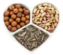 ظرف اردوخوری سرامیکی قلبی شامل ماکادمیا با پوست، پسته اکبری خندان و تخمه آفتابگردان خشکبار استور